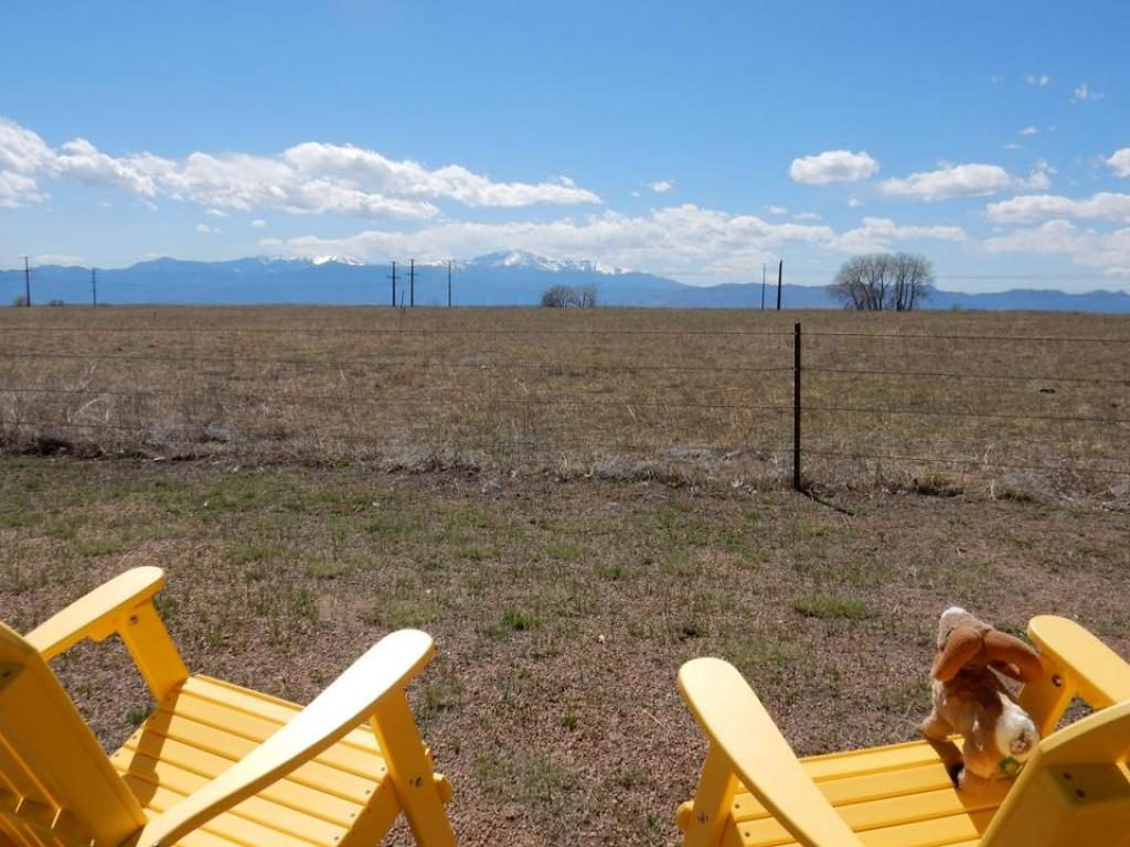Chairs with view of Pikes Peak